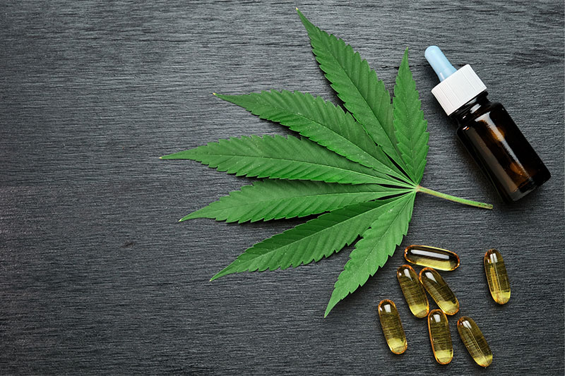 cbd oil products on a black background