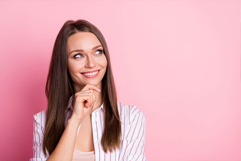 woman thinking if her cbd is a full spectrum or broad spectrum