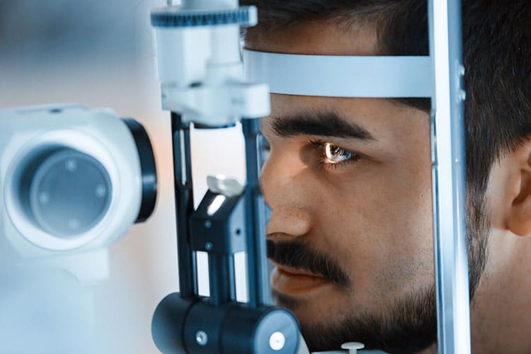 man taking an eye test for glaucoma