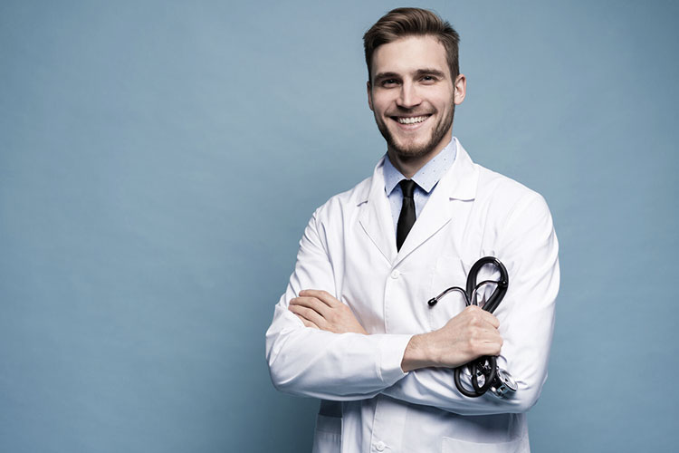 smiling doctor with his stethoscope